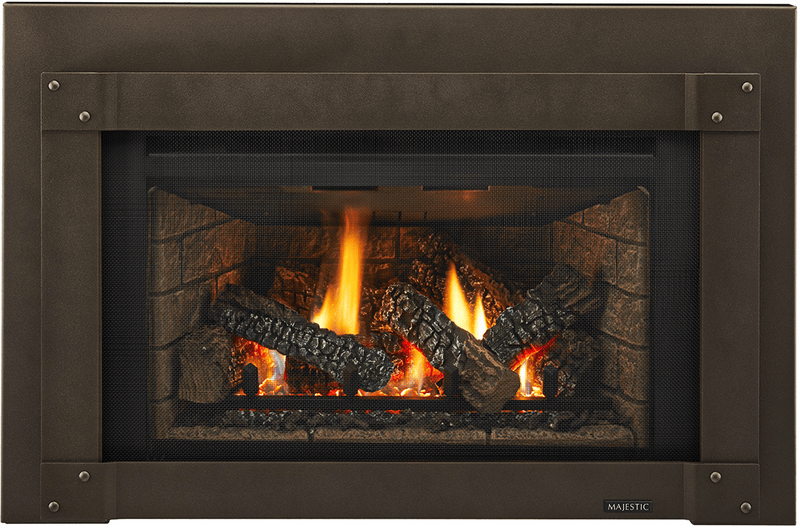 Majestic gas fireplace insert with bronze surround and charred gas logs