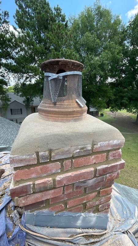 Same chimney topped with a new properly poured, sloped concrete crown after Madewell repair