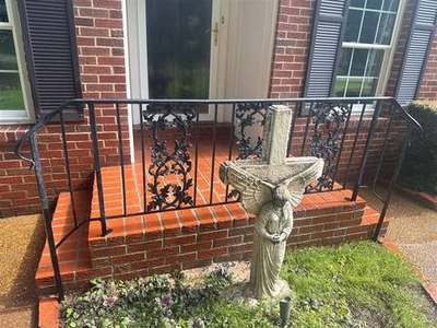 Brick front entry steps with fresh repointed mortar joints by Madewell Masonry in Memphis