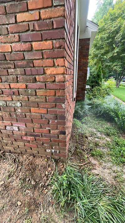 Brick wall corner with clean color-matched mortar joints by Madewell Masonry in Memphis