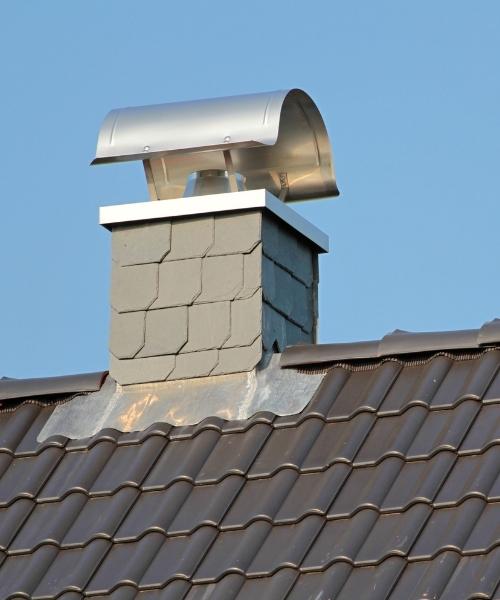 Chimney chase & metal chimney cap - Madewell Masonry